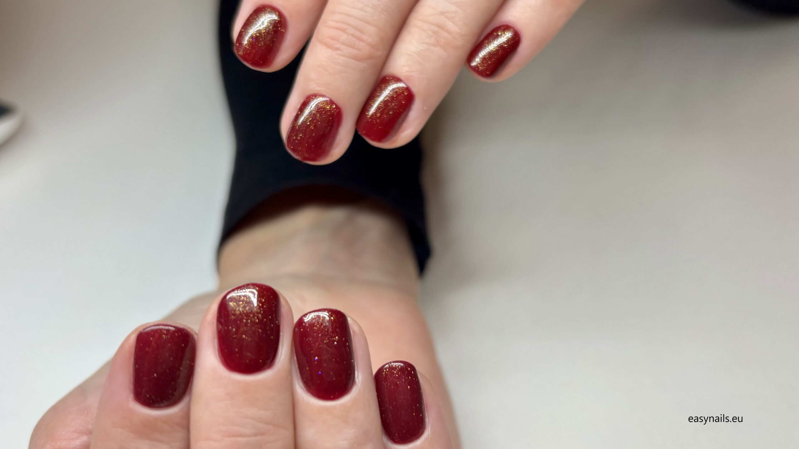 Red Nails with Glitter: Timeless Elegance and Modern Glamour